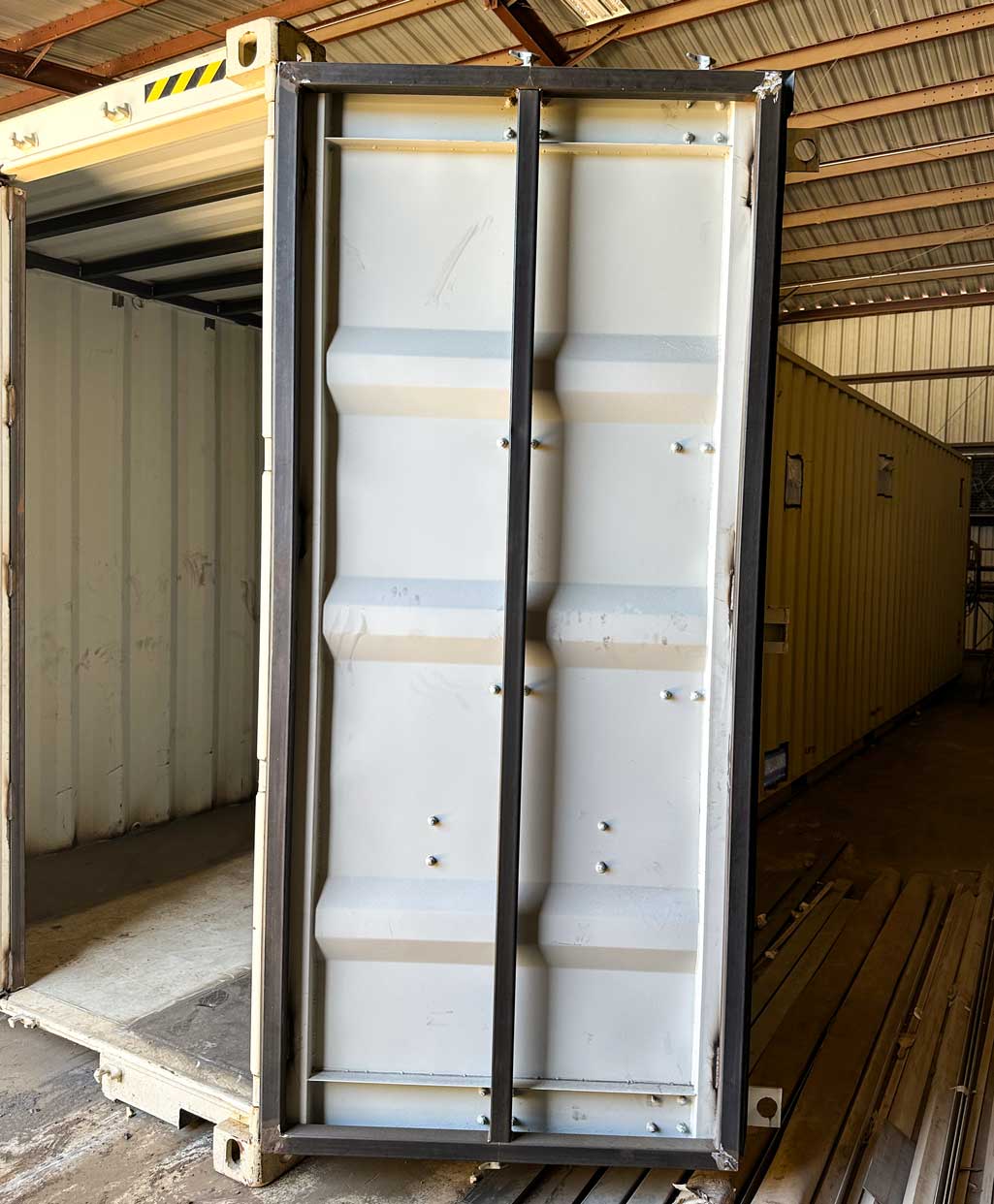 reinforcing doors with metal on a container