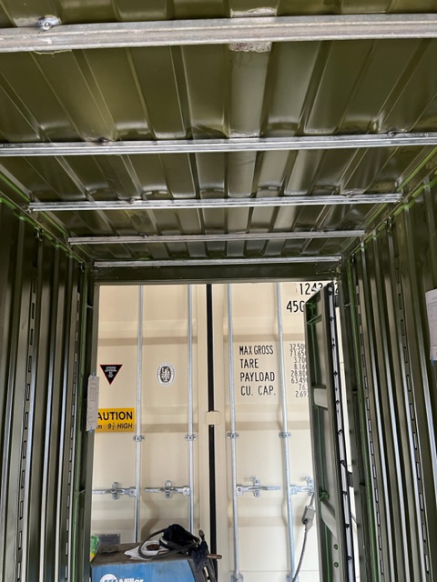 modified shipping container for a water purification set up